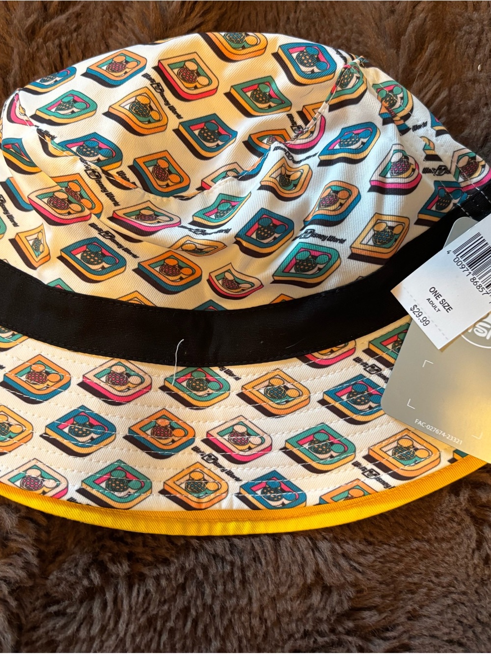 Disney Bucket Hat with Multicolor Retro Print. Adult one size fits most.